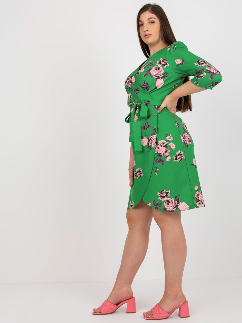 Groen kleedje met bloemen