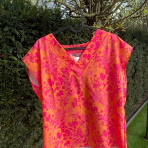 Oranje bloesje met roos