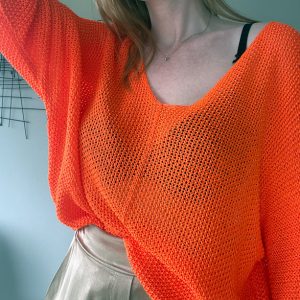 Oranje truitje met gaatjes
